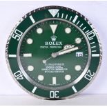 A ROLEX SHOP DISPLAY ADVERTISING WALL CLOCK. 33 cm diameter.