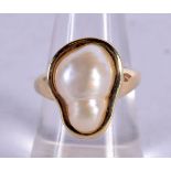 A 14CT GOLD RING SET WITH A NATURAL PEARL.  Size O, Stamped 14K, weight 5.7g