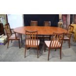 A large Teak dining table with 6 upholstered chairs 72 x 162 x 106 not extended (7)