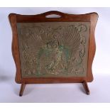 A RARE ARTS AND CRAFTS EMBOSSED OWL FIRE SCREEN decorated amongst vines. 60 cm x 55 cm.