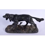 AN ANTIQUE CAST IRON FIGURE OF A ROAMING HUNTING HOUND. 28 cm x 14 cm.