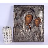 AN ANTIQUE RUSSIAN SILVER MOUNTED WOOD ICON. 27 cm x 22 cm.