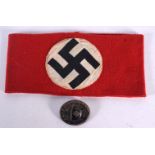 A GERMAN MILITARY ARM BAND and badge. Largest 19 cm wide. (2)