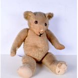 An antique teddy bear 61 cm.