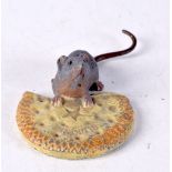 A COLD PAINTED BRONZE OF A MOUSE EATING A BISCUIT 10.2cm x 5.5cm x 2.5cm, weight 186.5g