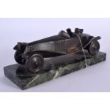 A RARE EUROPEAN ART DECO BRONZE CIGARETTE LIGHTER IN THE FORM OF A MODEL OF A CAR upon a