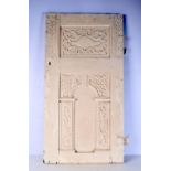 An early carved wooden panel 94 x 49 cm