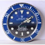 A ROLEX SHOP DISPLAY ADVERTISING WALL CLOCK. 33 cm diameter.