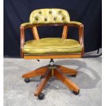 A Norwegian Mekkanik wood and leather swivel chair 81 x 61 x 66 cm