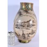 A LARGE 19TH CENTURY JAPANESE MEIJI PERIOD SATSUMA VASE painted with figures in landscapes. 38 cm x