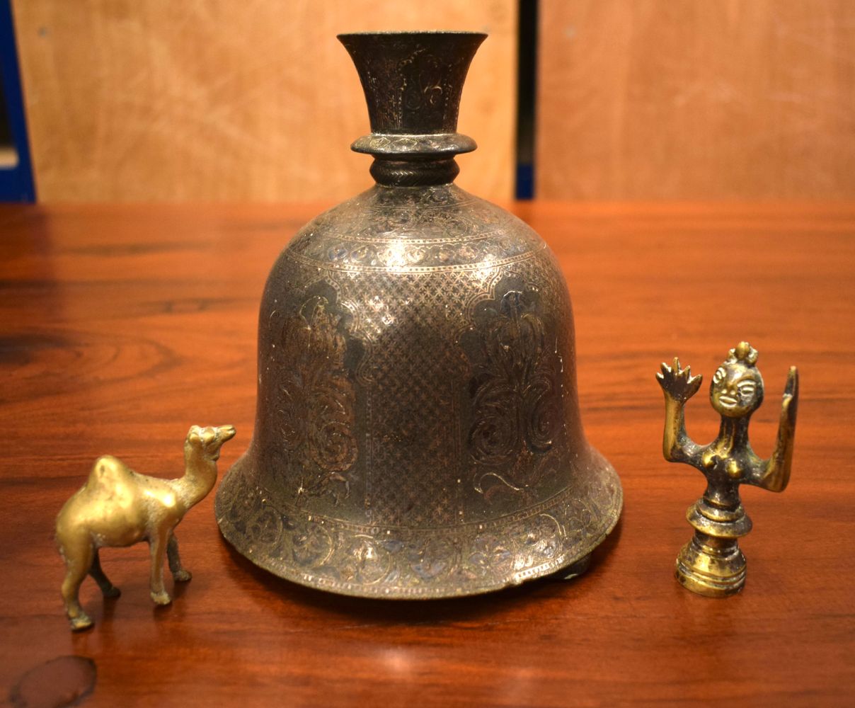 AN 18TH/19TH CENTURY MIDDLE EASTERN SILVER INLAID BRONZE HOOKAH PIPE BASE with two bronze figures. L