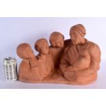 Gaston Hauchecorne (1880-1945) Terracotta, Grandmother with children. 42 cm x 30 cm.