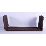 A MIDDLE EASTERN ISLAMIC CARVED WOOD SLIDING BOOK RACK. 60 cm x 15 cm extended.