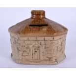 A CHARMING MID 19TH CENTURY ENGLISH SALT GLAZED POTTERY MONEY BOX formed as a cottage. 12 cm x 10 cm