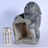 AN UNUSUAL LARGE NORTH AMERICAN INUIT CARVED STONE FIGURE modelled as an hunter. 30 cm x 13 cm.