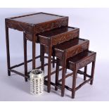 A RARE SET OF FOUR MINIATURE 19TH CENTURY CHINESE CARVED HARDWOOD TABLES. Largest 33 cm x 27 cm. (4)