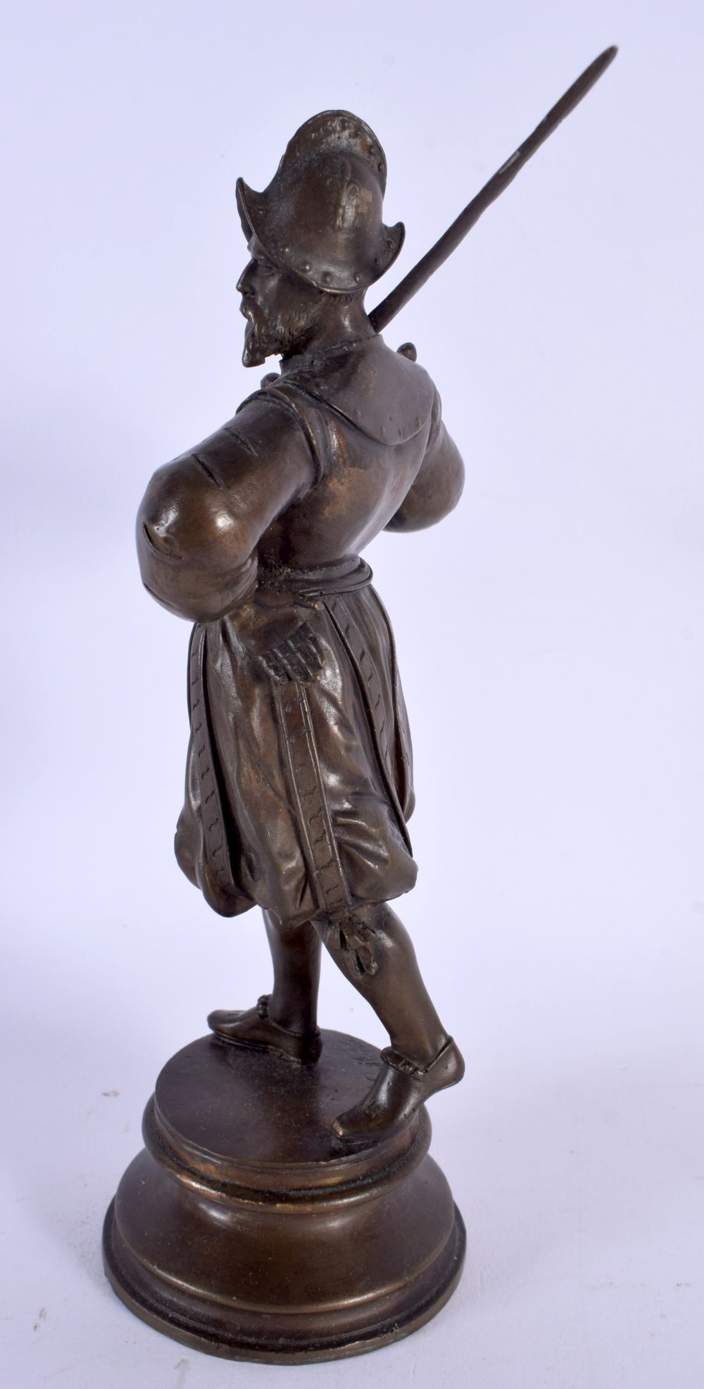 AN ANTIQUE FRENCH BRONZE FIGURE OF A MEDIEVAL SOLDIER modelled holding a sword. 23 cm high. - Image 2 of 4