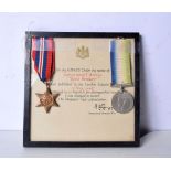 Two WW2 medals mounted to a plaque (2)