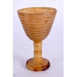 A RARE 19TH CENTURY EUROPEAN CARVED RHINOCEROS HORN GOBLET. 33 grams. 8 cm high.