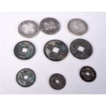 A collection of Chinese coins and tokens 4cm (9).