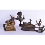 TWO 18TH CENTURY INDIAN BRONZE OIL LAMPS one formed as birds, the other as a Nandi cow. Largest 17 c