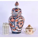 A 19TH CENTURY JAPANESE MEIJI PERIOD IMARI FLUTED VASE AND COVER together with a porcelain sucrier.