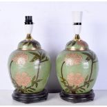 A pair of Chinese style enamelled metal lamps 25 cm (2).