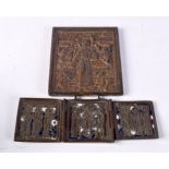 TWO BRONZE RUSSIAN ICONS. Largest 10.8cm x 8.9cm