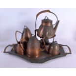 A STYLISH SECESSIONIST MOVEMENT COPPER TEASET ON TRAY. Largest 52 cm x 32 cm. (6)