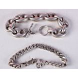 TWO CONTINENTAL SILVER BRACELETS. Stamped 800, longest 24cm, total weight 110g (2)