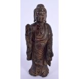 A CHINESE CARVED BUFFALO HORN TYPE FIGURE OF A STANDING BUDDHA 20th Century. 180 grams. 15 cm high.