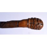 A 19TH CENTURY JAPANESE MEIJI PERIOD CARVED BAMBOO WALKING CANE. 83 cm long.