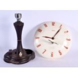 A VINTAGE SMITHS BAKELITE CLOCK together with a Bakelite lamp. Largest 18 cm wide. (2)