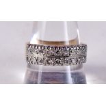 AN 18CT GOLD AND DIAMOND RING. SET WITH 18 DIAMONDS. Size S, weight 7g