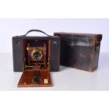 A cased Eastman & Kodak cased camera 21 x16cm.