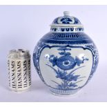 A 17TH/18TH CENTURY JAPANESE EDO PERIOD BLUE AND WHITE JAR AND COVER painted with flowers. 24 cm x 1