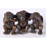 A BRONZE MODEL OF THE THREE WISE MONKEYS. 5.2cm x 8.7cm x 3.4cm