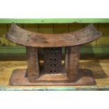 AN AFRICAN TRIBAL STOOL. 47 cm x 30 cm.