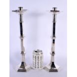 A LARGE PAIR OF ART DECO SILVER PLATED CANDLESTICKS. 38 cm high.