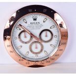 A ROLEX SHOP DISPLAY ADVERTISING WALL CLOCK. 33 cm diameter.