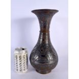 A 19TH CENTURY MIDDLE EASTERN SILVER INLAID MIXED METAL VASE decorated with motifs. 30 cm x 14 cm.