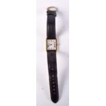 AN 18CT GOLD CARTIER TANK QUARTZ CARTIER SMALL LEATHER STRAP WATCH. Stamped 18K, Dial 2.4cm incl cr