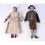 A pair of antique French folk art dolls , Mr Guillotine and Madame Bovery 50 cm.