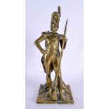 AN UNUSUAL ANTIQUE MILITARY BRONZE FIGURE. 24 cm high.