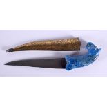 A MIDDLE EASTERN ISLAMIC LAPIS LAZULI KNIFE with engraved iron scabbard. 18 cm long.