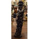 AN AFRICAN TRIBAL WOOD FIGURE. 60 cm high.