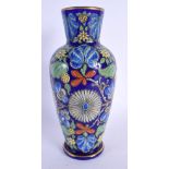 AN AESTHETIC MOVEMENT ENAMELLED GLASS VASE painted with flowers. 23 cm high.