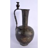 A LARGE ANCIENT MIDDLE EASTERN BRONZE WINE JUG. 32 cm high.