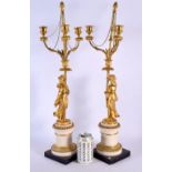 A LARGE PAIR OF EARLY 19TH CENTURY FRENCH ORMOLU AND MARBLE CANDLESTICKS. 60 cm high.