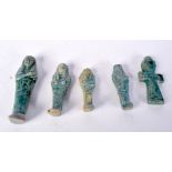 A collection of Egyptian glazed pottery Pharaohs, cross etc 9 cm (5)